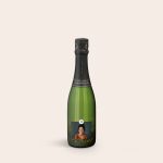 Green bottle of champagne with a personalized label featuring a photo of a smiling woman and the number 35