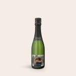 Green bottle of champagne with a personalized label, printed with a romantic couple photo and Merry Christmas text.