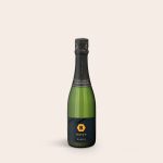 Green champagne bottle with a black personalised label printed with a golden B and the name Baidu Daniel.
