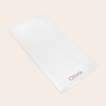 Personalized white bath towel embroidered with the name Olivia to create something special