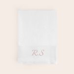 Personalised white bath towel with embroidered pink initials RS
