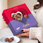 Personalised Milka Hearts 3D Gift Box with a photo of a couple and the name Sophie, next to heart shaped chocolates