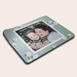 Personalized photo mouse mat in light blue with white daisies printed with a photo of a woman and child and the text Goodbye Miss Young