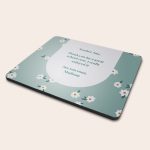 Personalized photo mouse mat with a daisy pattern, printed with text Teacher Amy, Thank you for a great school year, I really enjoyed it See you soon, Madison