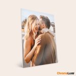 ChromaLuxe aluminum photo frame printed with a happy couple hugging, displaying a personalized photo.