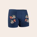 Dark blue boxer shorts printed with multiple circular photos of a boy and man on skateboards and scattered red hearts. Create boxer shorts that are as unique as he is.