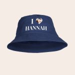 Navy personalized bucket hat printed with a photo of a couple in a heart shape and the name Hannah