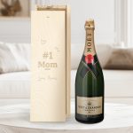 Moët & Chandon champagne bottle next to an engraved wooden case with #1 Mom Love Aimee
