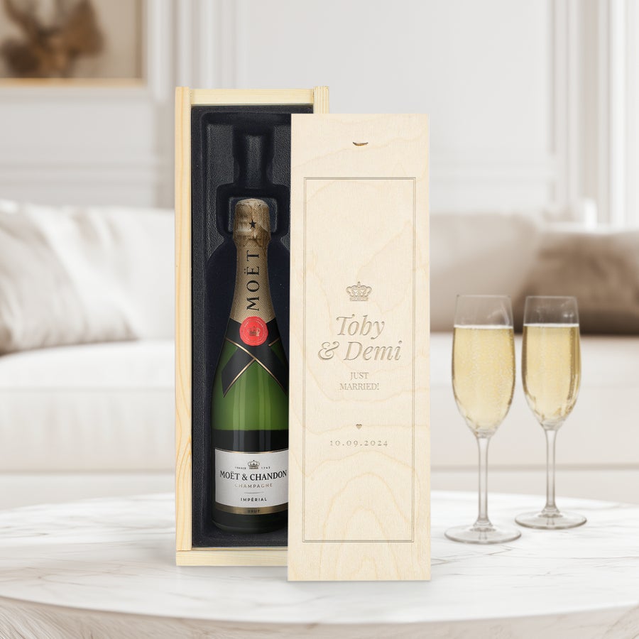 Moet & Chandon champagne bottle in an engraved wooden gift case with names and a date