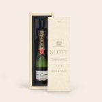 Moet & Chandon champagne in a luxurious wooden case engraved with "SCOTT" and "SEAN & DEAN"