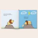 A personalized goodnight storybook open to a page with a lion and a chick.