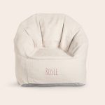 Beige children's chair with the name ROSIE embroidered in pink on the front. What child wouldn't be happy with such a cool, trendy chair.