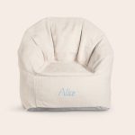 Cream colored children's bean bag chair embroidered with the name Alice in blue. A cool chair for any child.