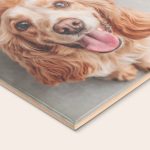 Personal ceramic tile printed with a photo of a happy brown dog.