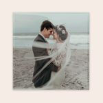 Ceramic tile with a wedding photo of a couple on a beach printed as a personal picture