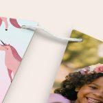 Personalised garland - Triangle - M - 5m printed with a magical unicorn design and a custom photo of a smiling girl