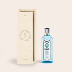 Bombay Sapphire gin in an engraved wooden case with a personalized initial and name