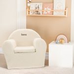 Cream personalised kids teddy chair with the name Emma embroidered on the backrest