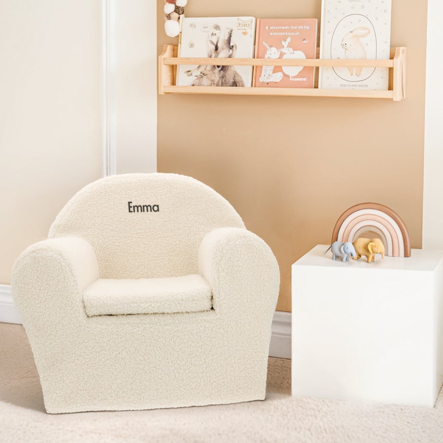 Cream personalised kids teddy chair with the name Emma embroidered on the backrest