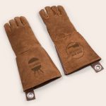 Brown personalized engraved leather BBQ gloves with name Brandon and a BBQ graphic.