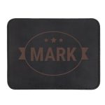 Black leather mousepad with the name MARK engraved, featuring a stylish design with three stars and a ribbon accent