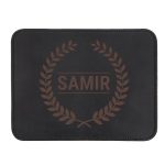 Black leather mousepad with engraved name Samir inside a laurel wreath design