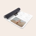 Personalised mouse mat printed with a child playing on the beach and a calendar, perfect for gaming enthusiasts.