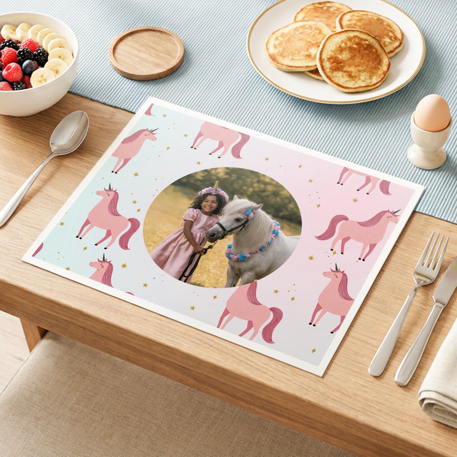 Custom placemat with unicorn design printed with a personalized photo of a girl and her pony, perfect for any unicorn fan