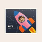 Personalized space-themed birthday invitation card with a child's photo and custom party details printed on it