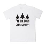 White polo shirt printed with black trees and I'M THE BOSS CHRISTOPH personalized text
