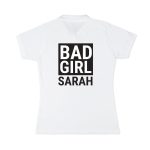 White women's polo shirt printed with "BAD GIRL SARAH" in black text, a custom design.