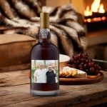 A personalized Graham's 20 years port bottle with a custom photo label featuring two men.