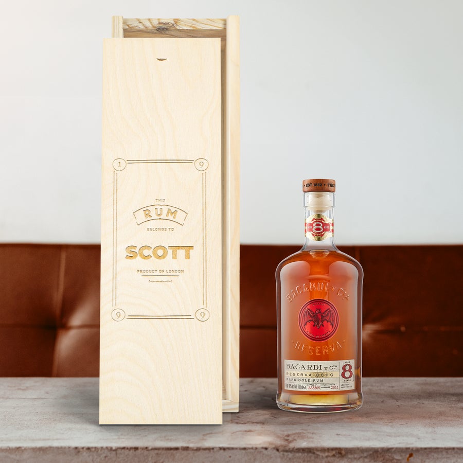 Bacardi Reserva Ocho rum in an engraved wooden case with the name Scott customized on the lid.