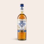 Bottle of Old Captain brown rum with a blue and white label featuring palm trees and a ship.