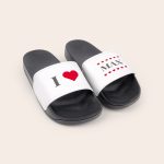 Black and white personalized sliders printed with a red heart and the name MAX, a perfect gift for summer