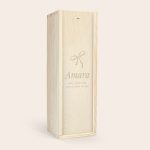 Personalized Amaretto Disaronno in an engraved wooden case with a bow design and custom text Amara all I want for Christmas is you