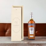 Ricard Pastis liqueur bottle next to an engraved wooden case featuring the name Harry and Happy Birthday text