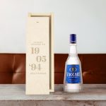 Sambuca Vaccari liqueur in an engraved wooden case with Happily Married On, a date, and Holly & Adam.