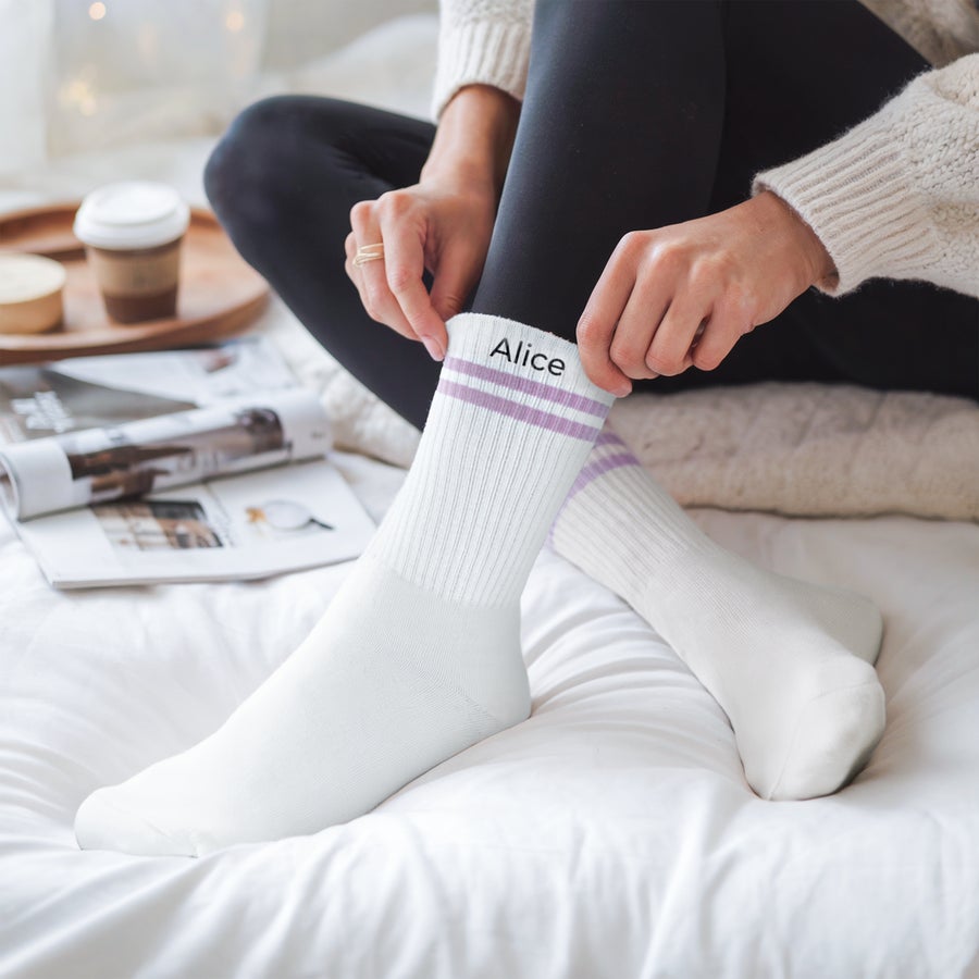 Personalized sports socks for women with the name Alice printed on the cuff
