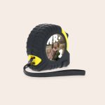 Black and yellow tape measure with a printed photo of a man and child and