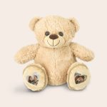 Personalised teddy bear with cool feet pockets printed with a photo of a couple on each foot