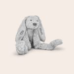 Personalised grey Tiny Rabbit Richie cuddly toy embroidered with the names Orla and Williams on its ears for endless cuddles