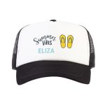 Black and white personalized trucker cap printed with "Summer Vibes," yellow flip-flops, and the name "Eliza."