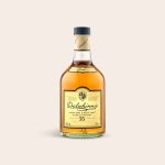 Bottle of Dalwhinnie 15 Years whisky with a golden label, ready for a personalized engraved wooden case