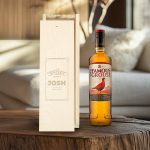 The Famous Grouse whisky in an engraved wooden case with the name Josh and a custom message.