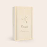 Engraved wooden case for Gentleman Jack whisky with a bow design and the name Dean