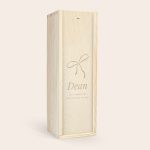 Light wood case for a bottle of Highland Park 12 Years whisky, engraved with a bow, the name Dean, and "all I want for Christmas is you."