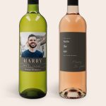 Belvy white and rosé wine bottles with custom printed labels. The white wine label features a photo of a man, his name Harry, and "Happy birthday." The rosé wine label says "This wine suits the age you have become" and "Harry 36 years."