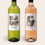 Two bottles of Belvy wine, white and rosé, each with a personalized printed label featuring photos of a mother and child, with Melanie and Best Mum Ever on the white wine, and Melanie and Crazy about you on the rosé wine.