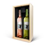 Two bottles of Oude Kaap wine in a wooden case, each with a personalized label printed with a photo and the name Vera